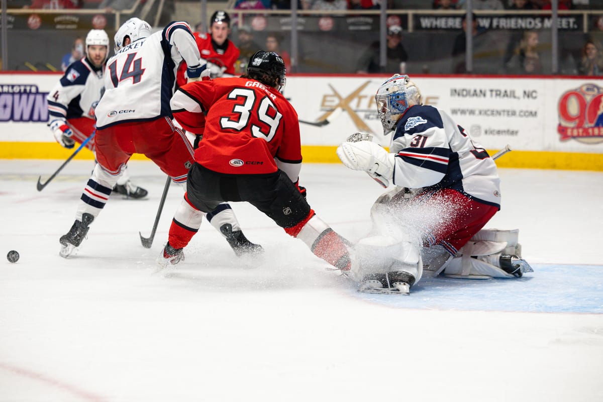 Wolf Pack Break Hearts, Beat Checkers 3-2